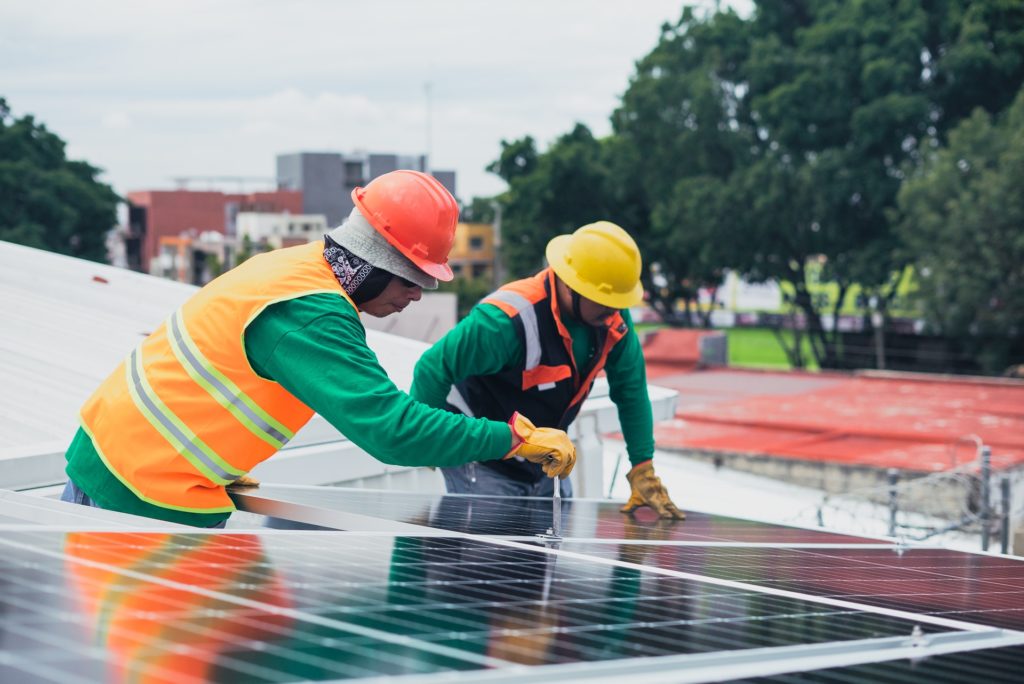 Working on Solar Panels
Photo by Los Muertos Crew from Pexels